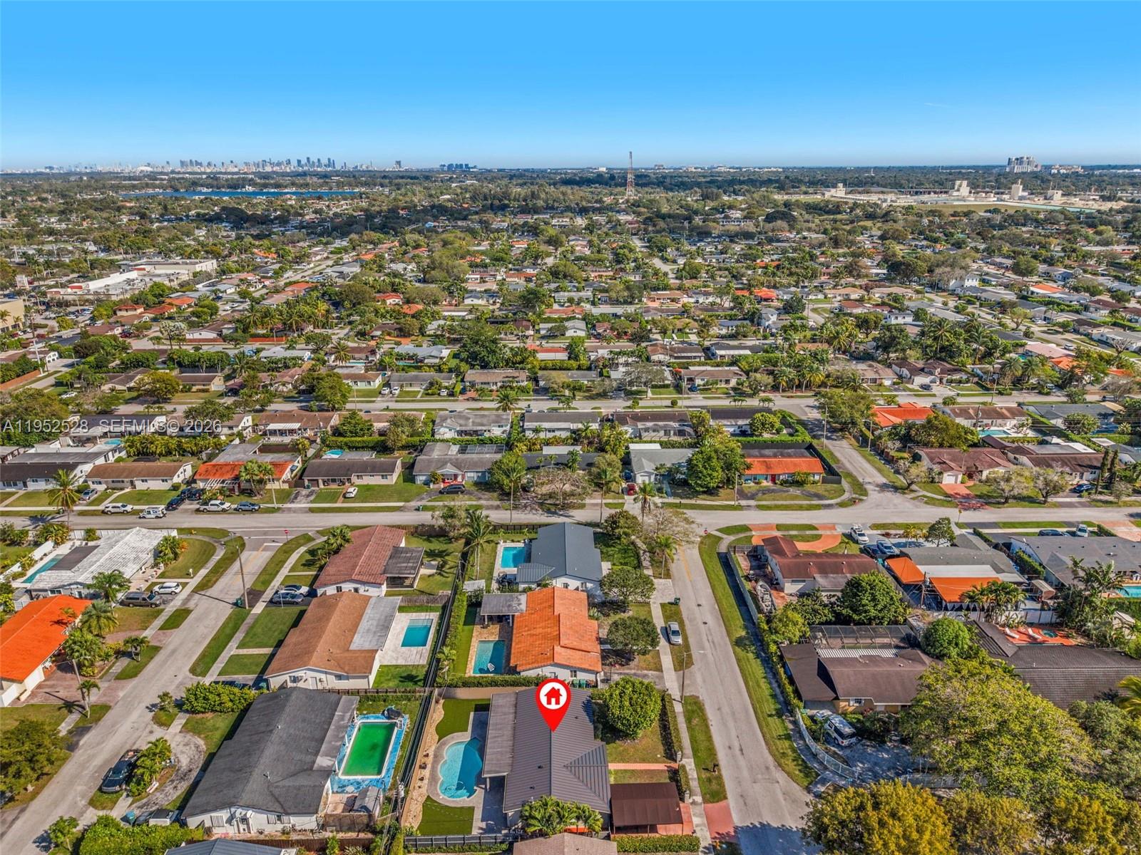 9567 Southwest 59th Terrace Miami, FL 33173 - Photo 36 of 36 an aerial view of residential building and parking space