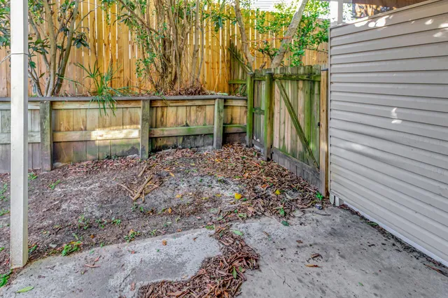 a view of a backyard of the house
