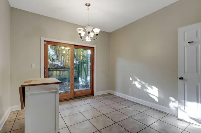 a view of a room with a chandelier