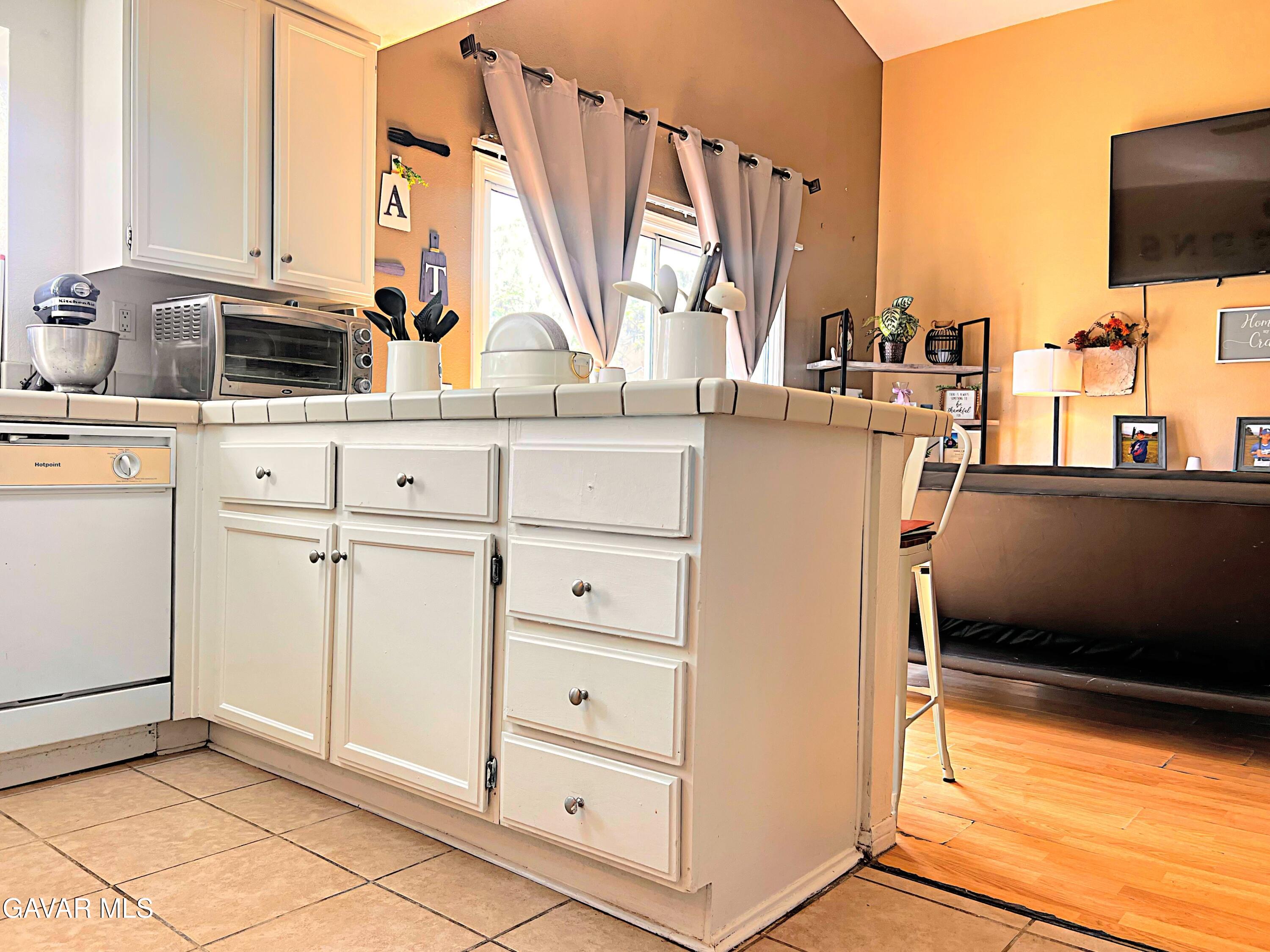 2428 Dixie Street Rosamond, CA 93560 - Photo 12 of 29 a view of a refrigerator and window