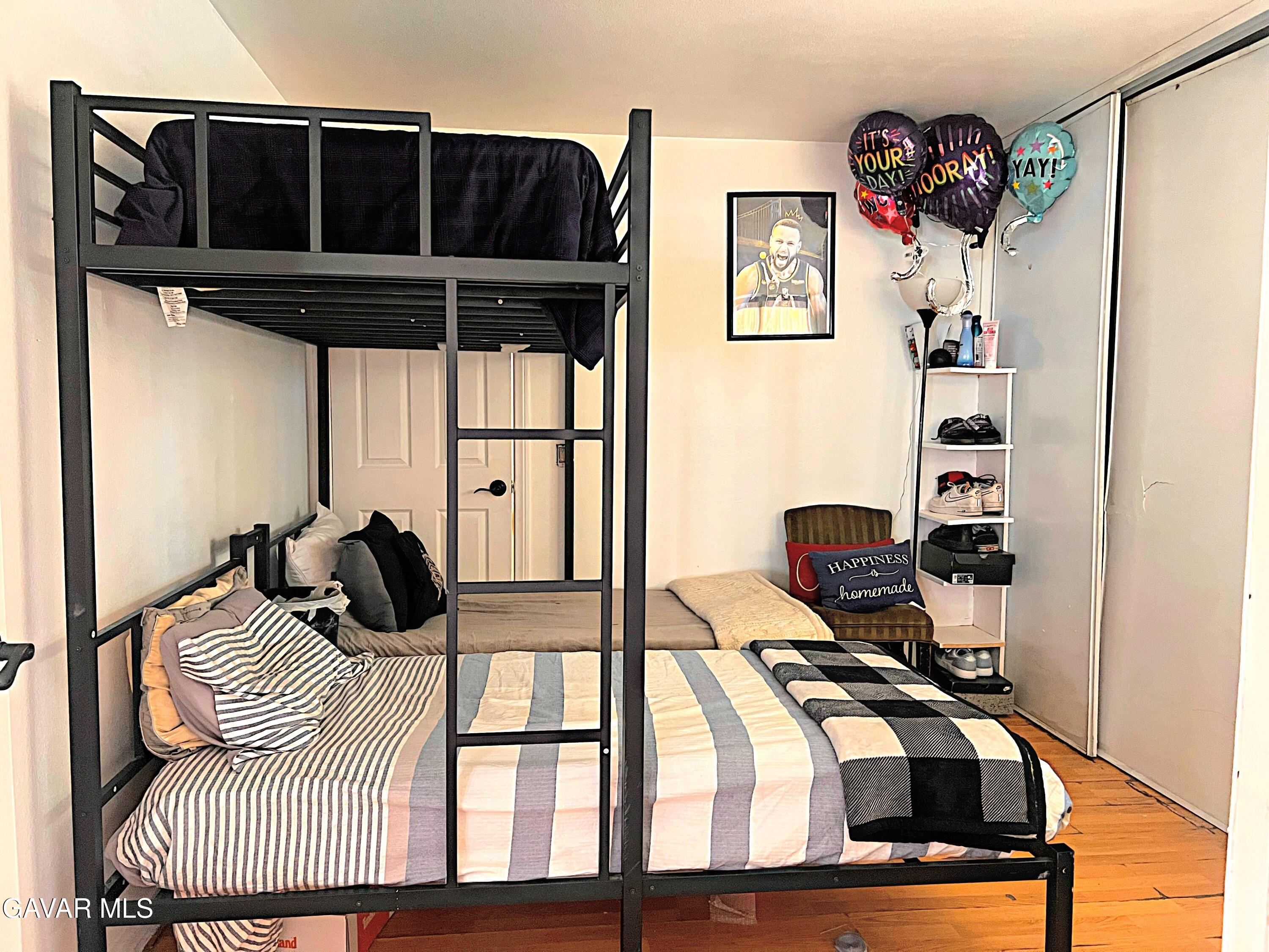 2428 Dixie Street Rosamond, CA 93560 - Photo 19 of 29 a bedroom with a bed and a window