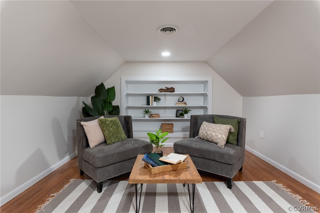 11711 Robious Road Midlothian, VA 23113 - Photo 21 of 32 a living room with furniture and wooden floor