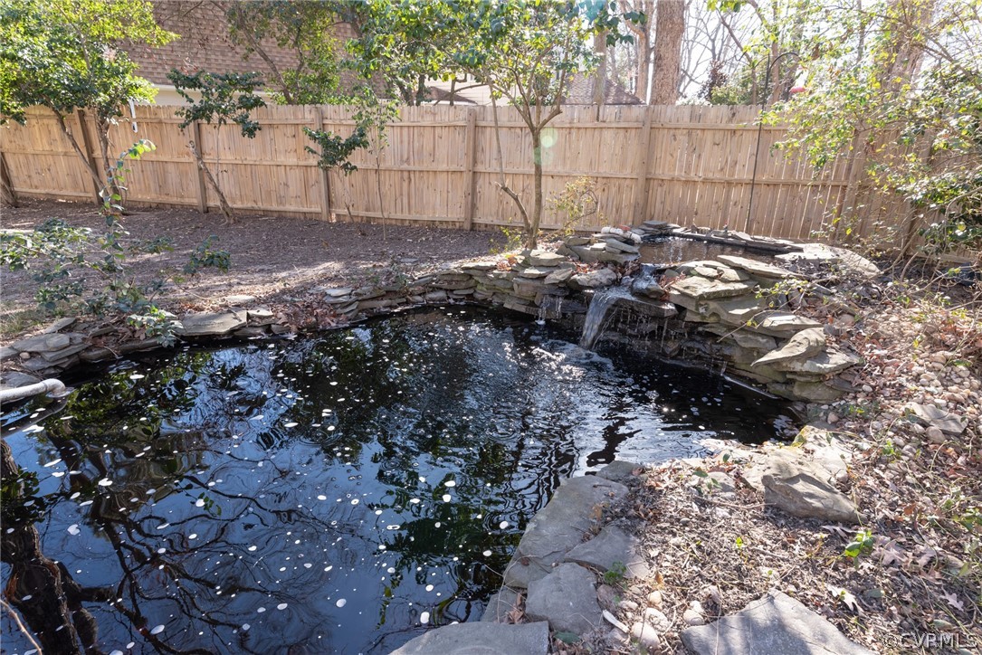 11711 Robious Road Midlothian, VA 23113 - Photo 32 of 32 a view of a backyard of the house
