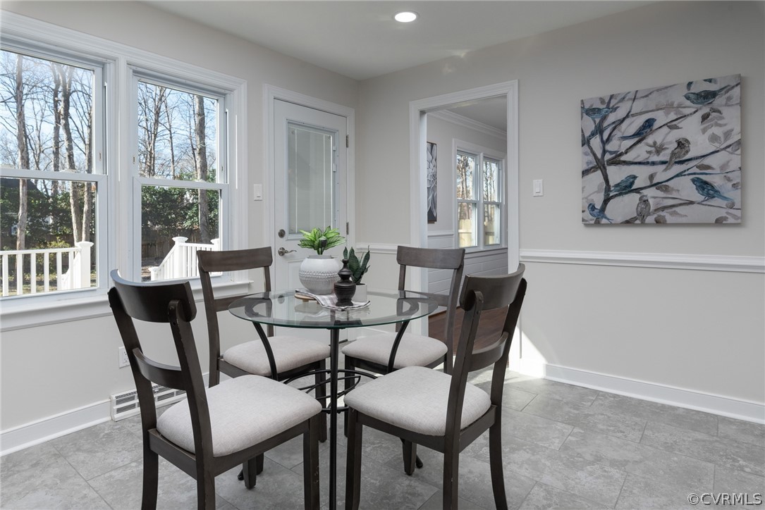 11711 Robious Road Midlothian, VA 23113 - Photo 10 of 32 a view of a dining room with furniture and wooden floor