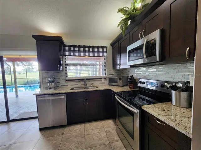 $340,000 | 34386 Whispering Oaks Boulevard, Dade City, FL 33523