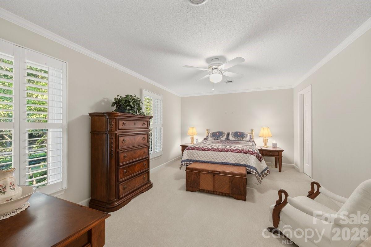 207 Lost Corner Road Morganton, NC 28655 - Photo 37 of 46 a bedroom with furniture and a window