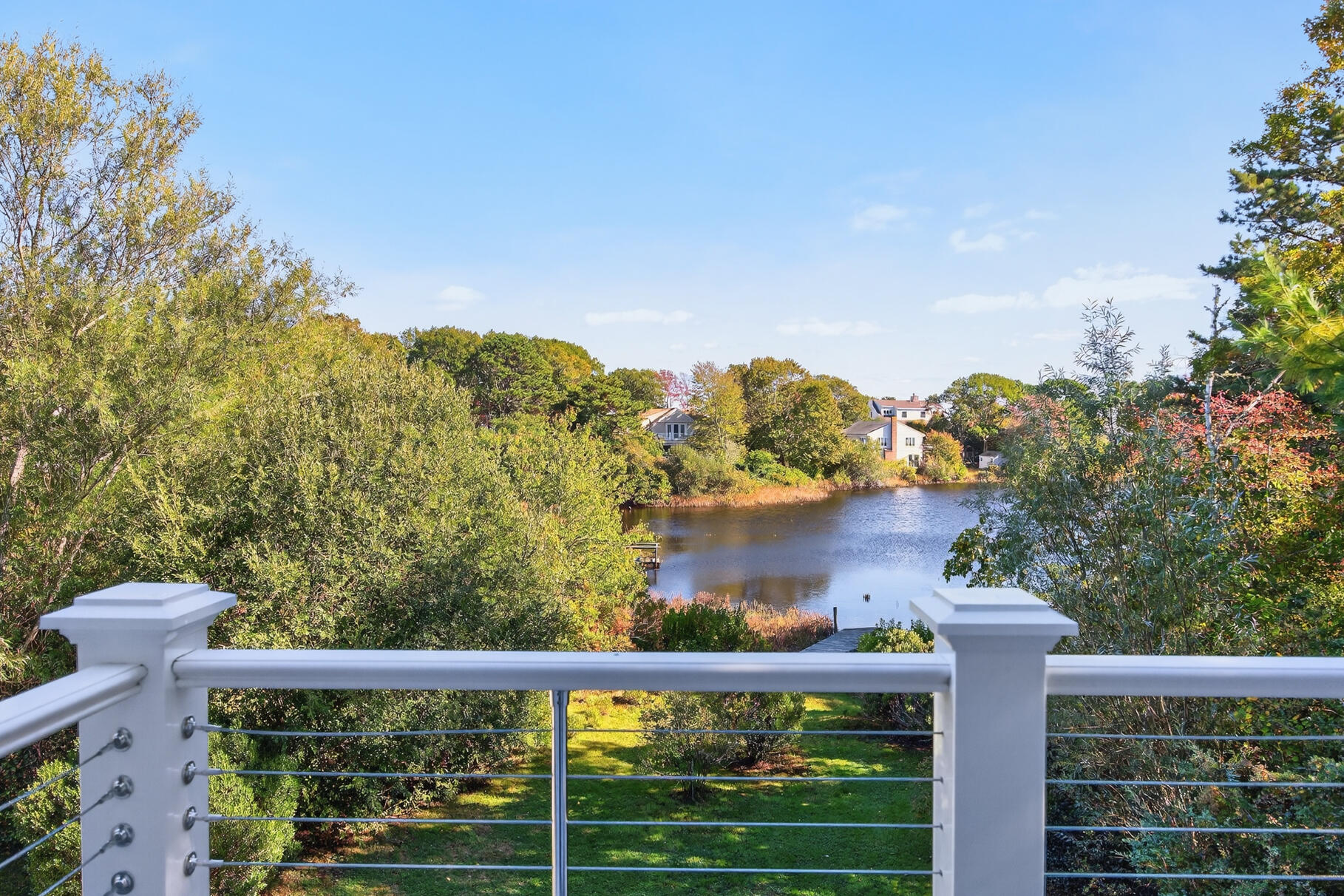 128 Uncle Percy's Road Mashpee, MA 02649 - Photo 24 of 45 a view of a balcony with lake view