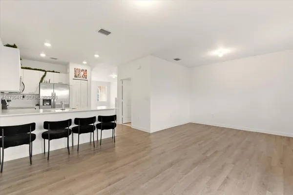 a view of kitchen with breakfast area