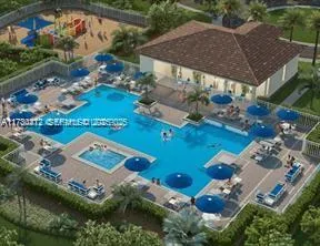 an aerial view of a house with a garden
