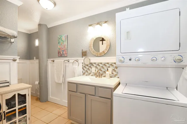 a bathroom with a shower curtain and a toilet