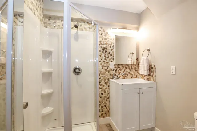 a view of house with outdoor seating and city view