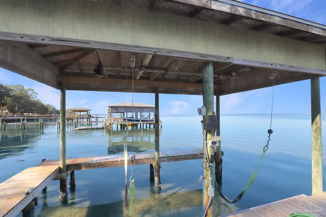 a swimming pool with barbeque oven