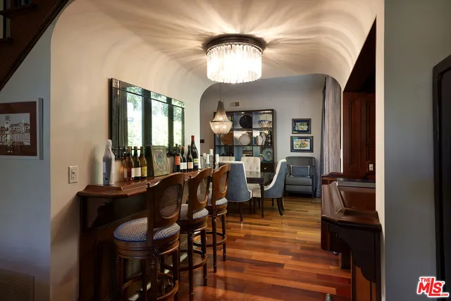 a room with furniture and a wooden floor