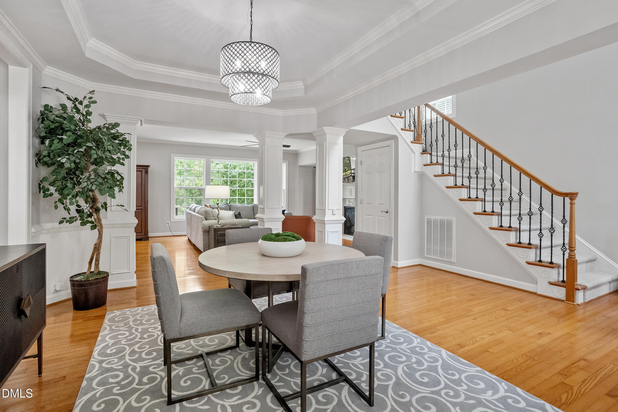 1019 Bianco Drive Raleigh, NC 27607 - Photo 6 of 29 a view of a dining room with furniture window and wooden floor