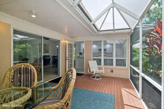 a view of balcony with furniture