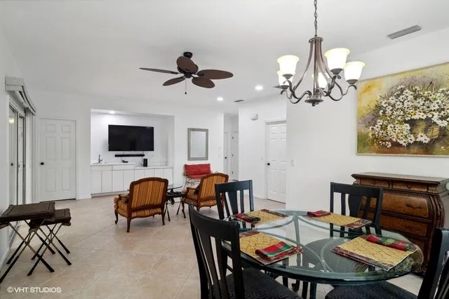 a view of a dining room with furniture