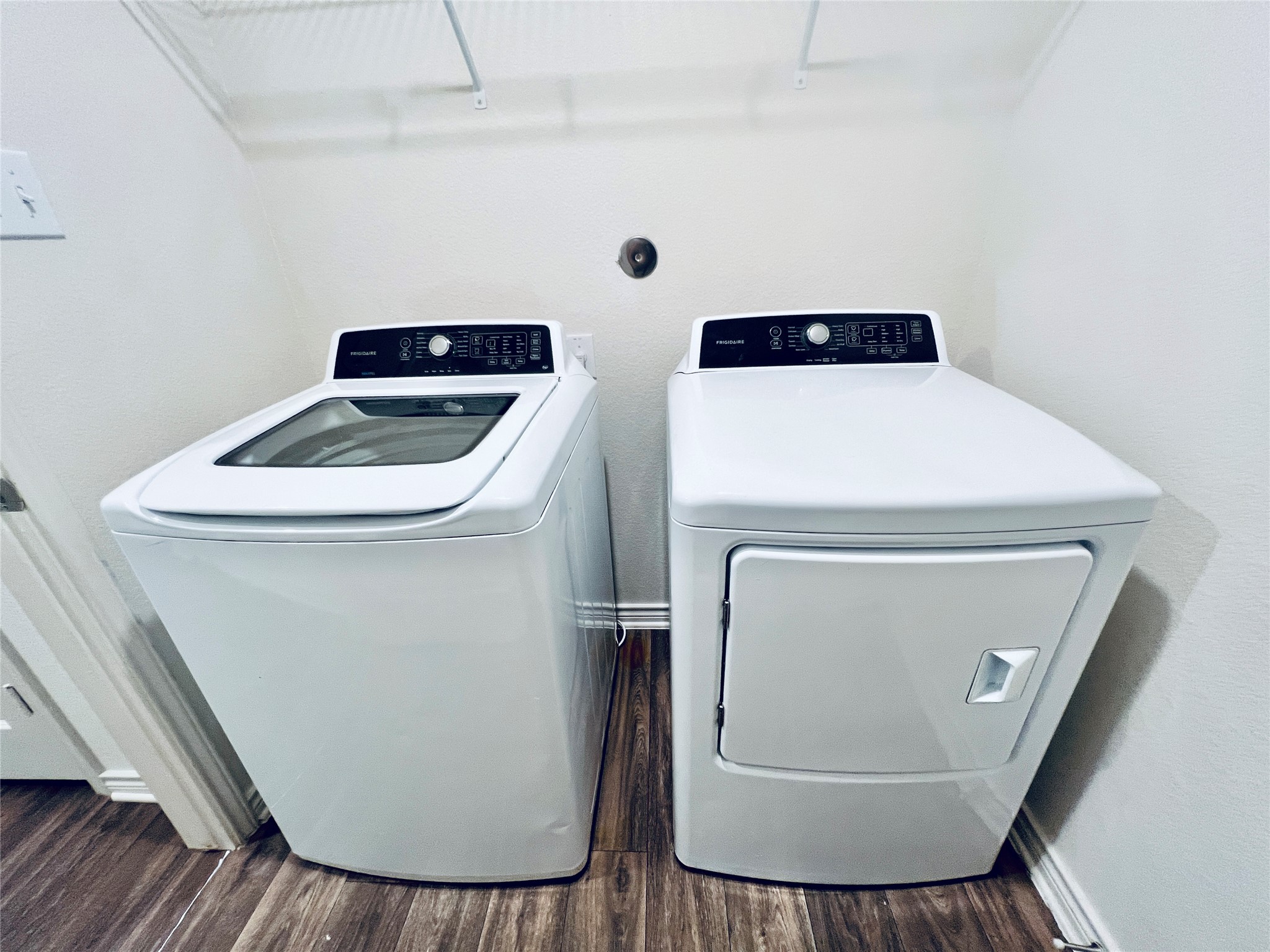 520 Locksley Cove Jarrell, TX 76537 - Photo 15 of 27 Modern laundry appliances offer convenience and efficiency for daily chores.