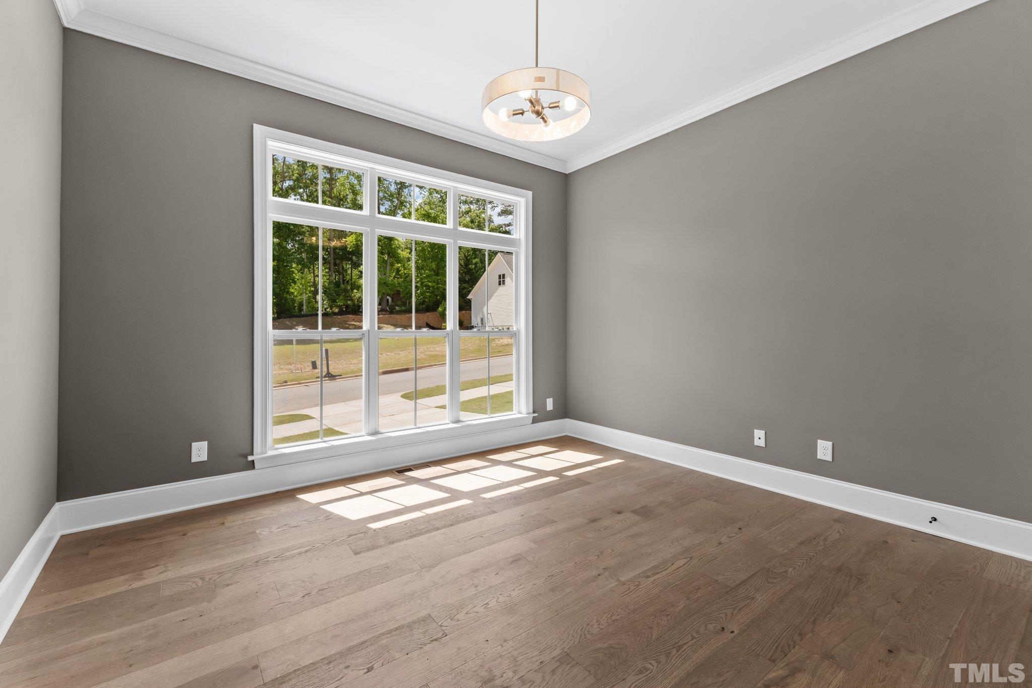 9312 Field Maple Court Raleigh, NC 27613 - Photo 36 of 49 a view of an empty room with a window