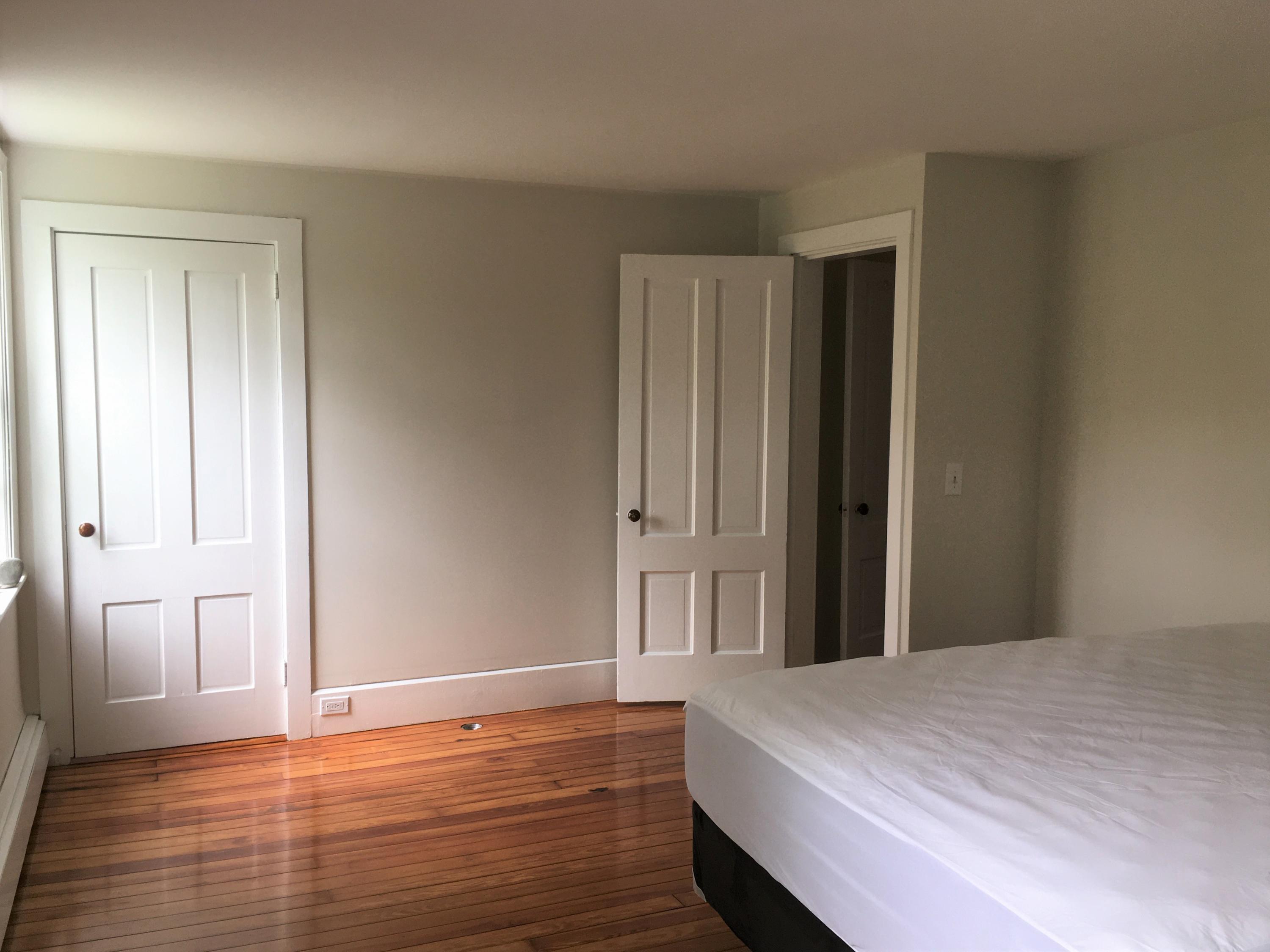 99 Main Street Sandwich, MA 02563 - Photo 11 of 17 a view of a room with wooden floor and closet