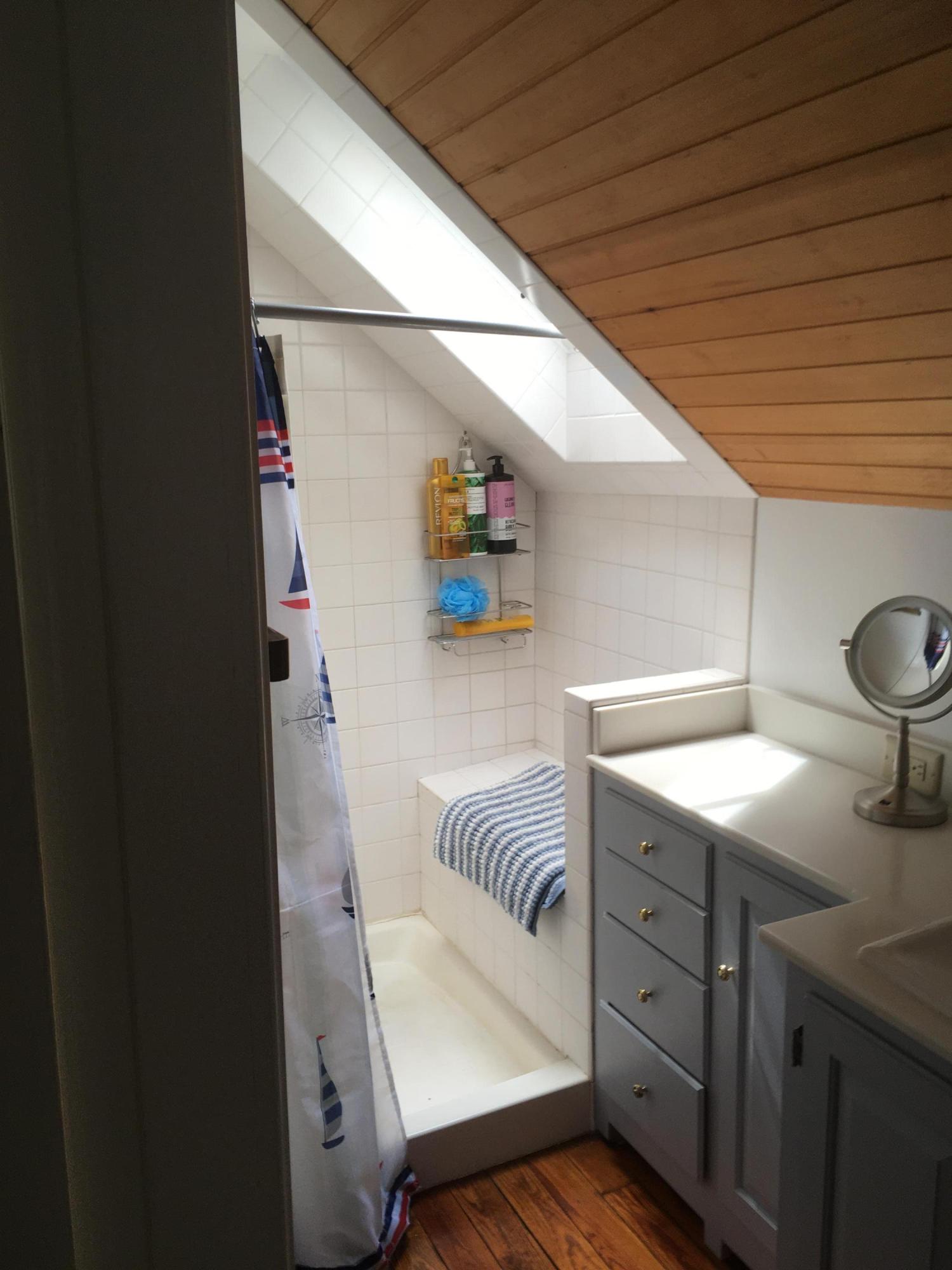 99 Main Street Sandwich, MA 02563 - Photo 16 of 17 a bedroom with a bed and a table