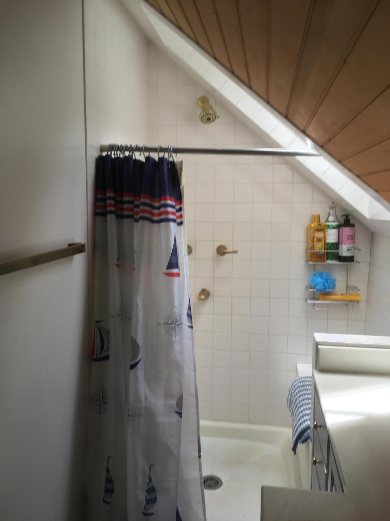 99 Main Street Sandwich, MA 02563 - Photo 17 of 17 a bathroom with a shower and a sink