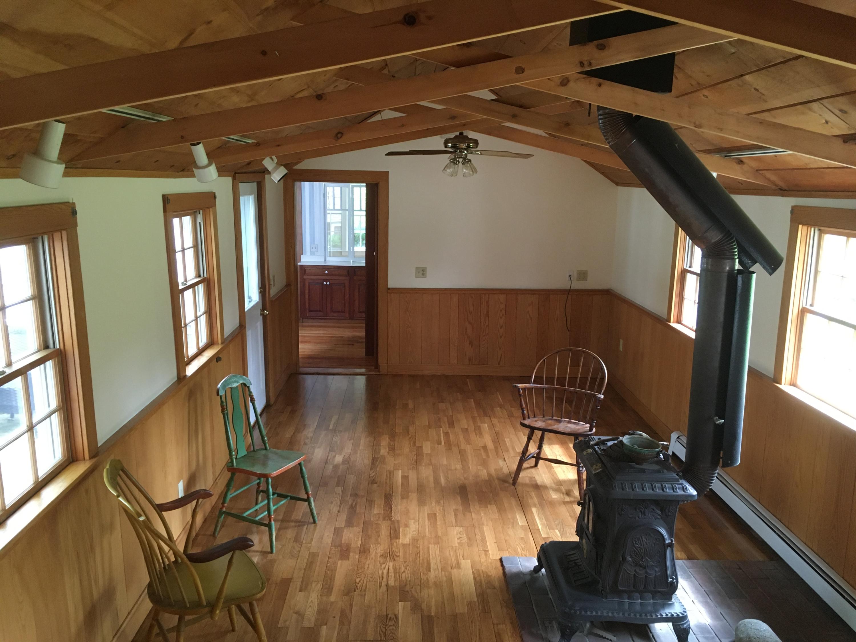 99 Main Street Sandwich, MA 02563 - Photo 2 of 17 a view of entryway and hall with wooden floor