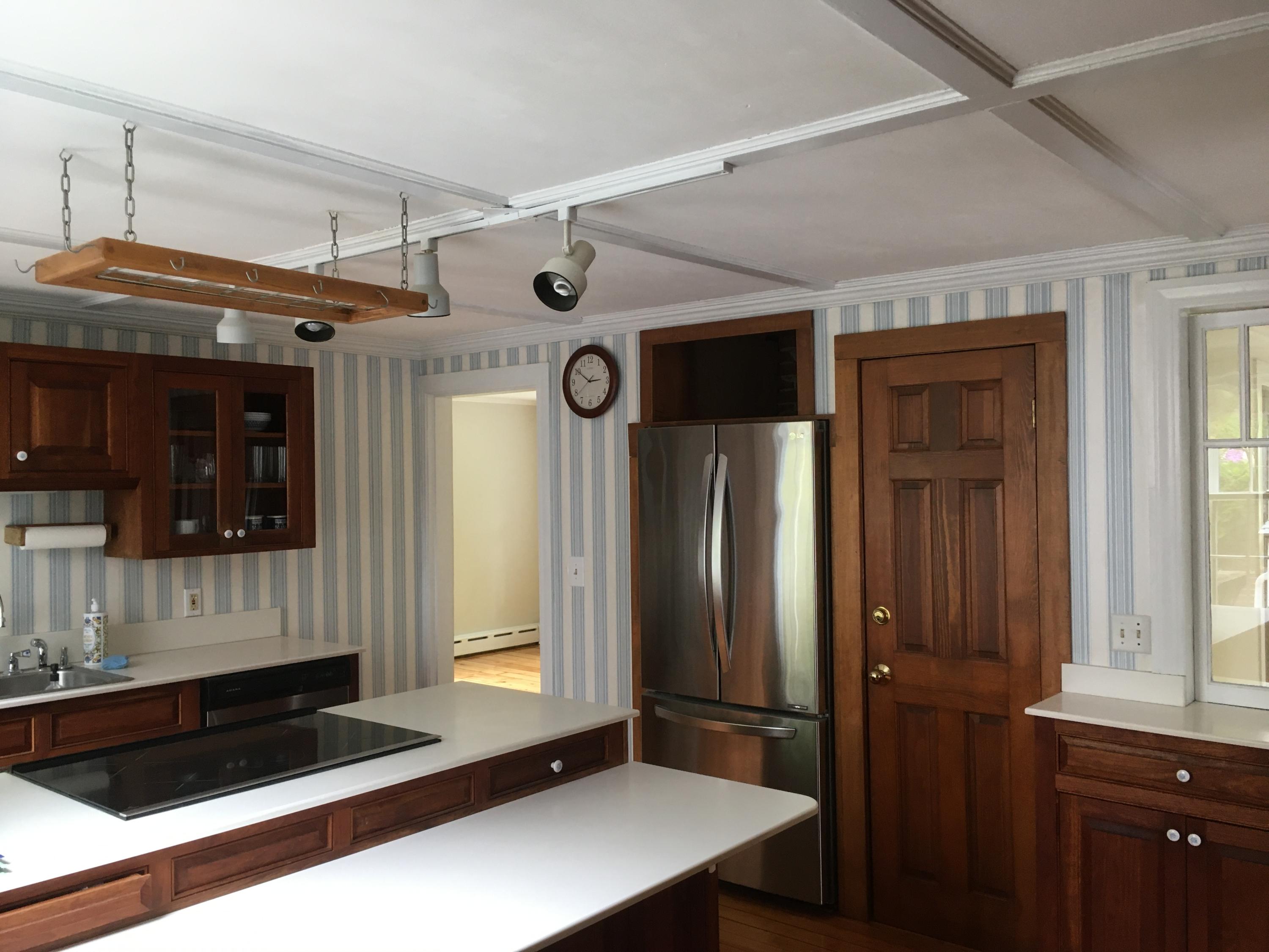 99 Main Street Sandwich, MA 02563 - Photo 3 of 17 a view of a entryway door of the house