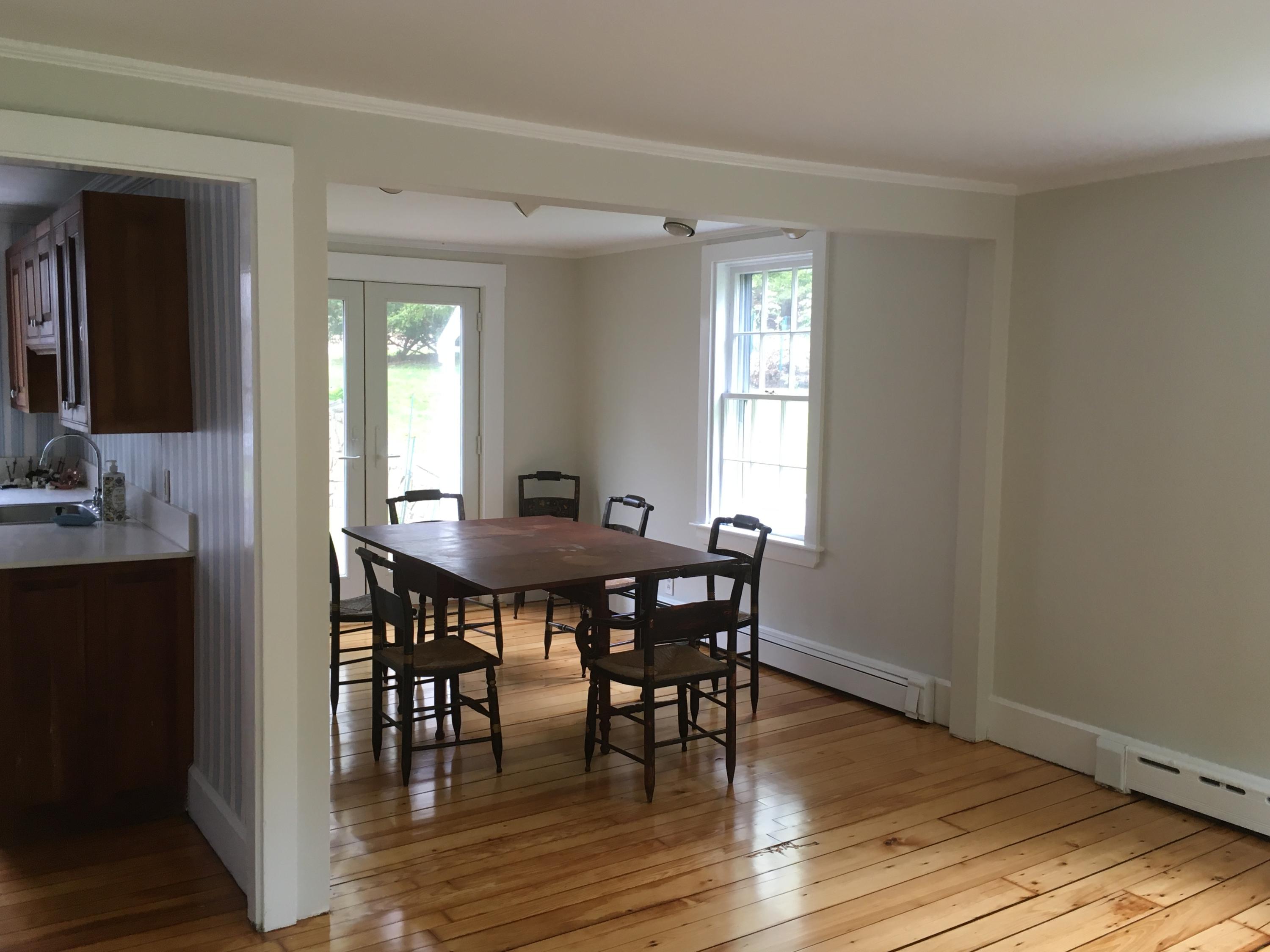 99 Main Street Sandwich, MA 02563 - Photo 4 of 17 a view of a dining room with furniture and wooden floor