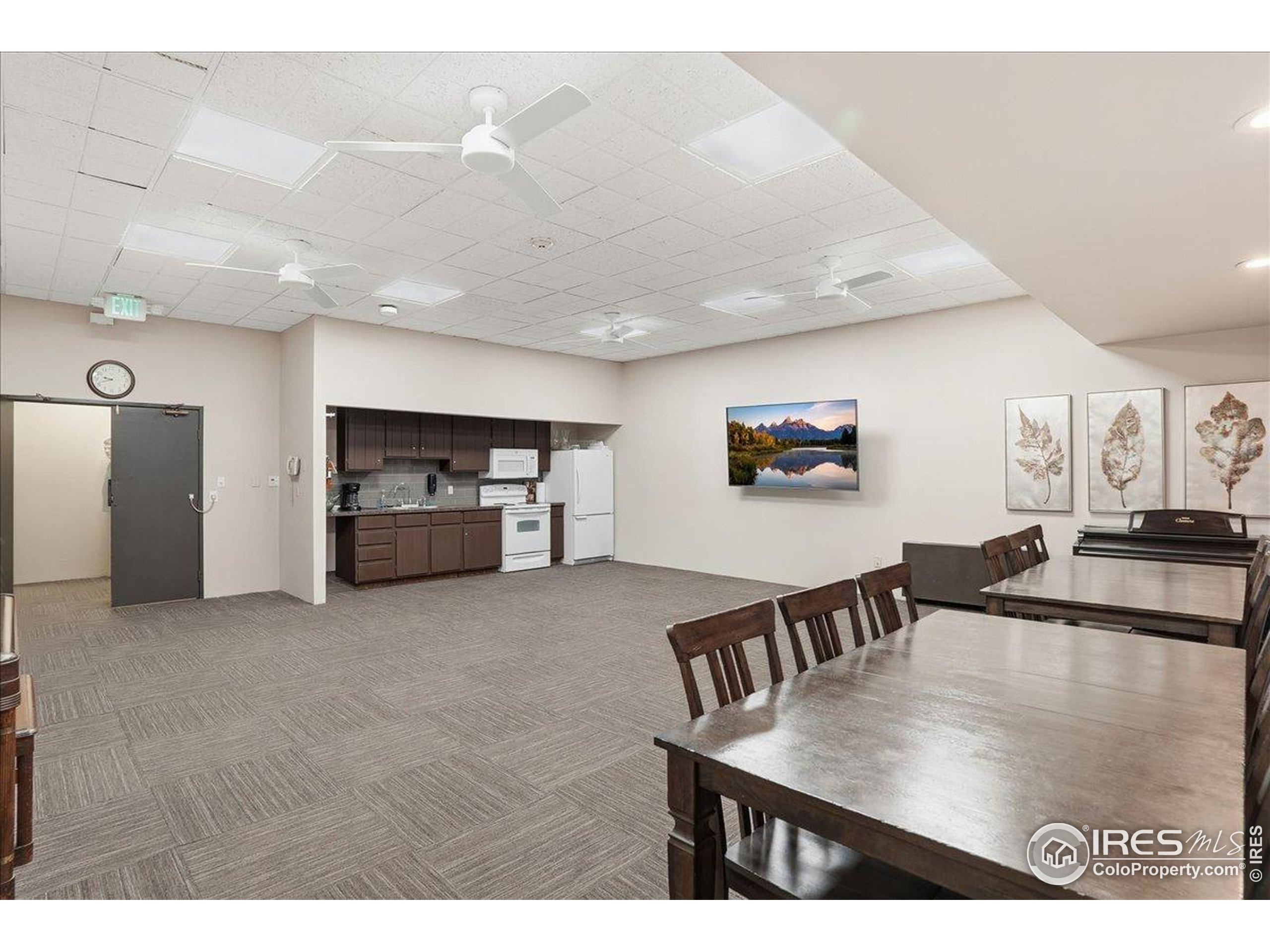 415 South Howes Street, Unit N206 Fort Collins, CO 80521 - Photo 44 of 48 a view of a dining room with furniture and wooden floor