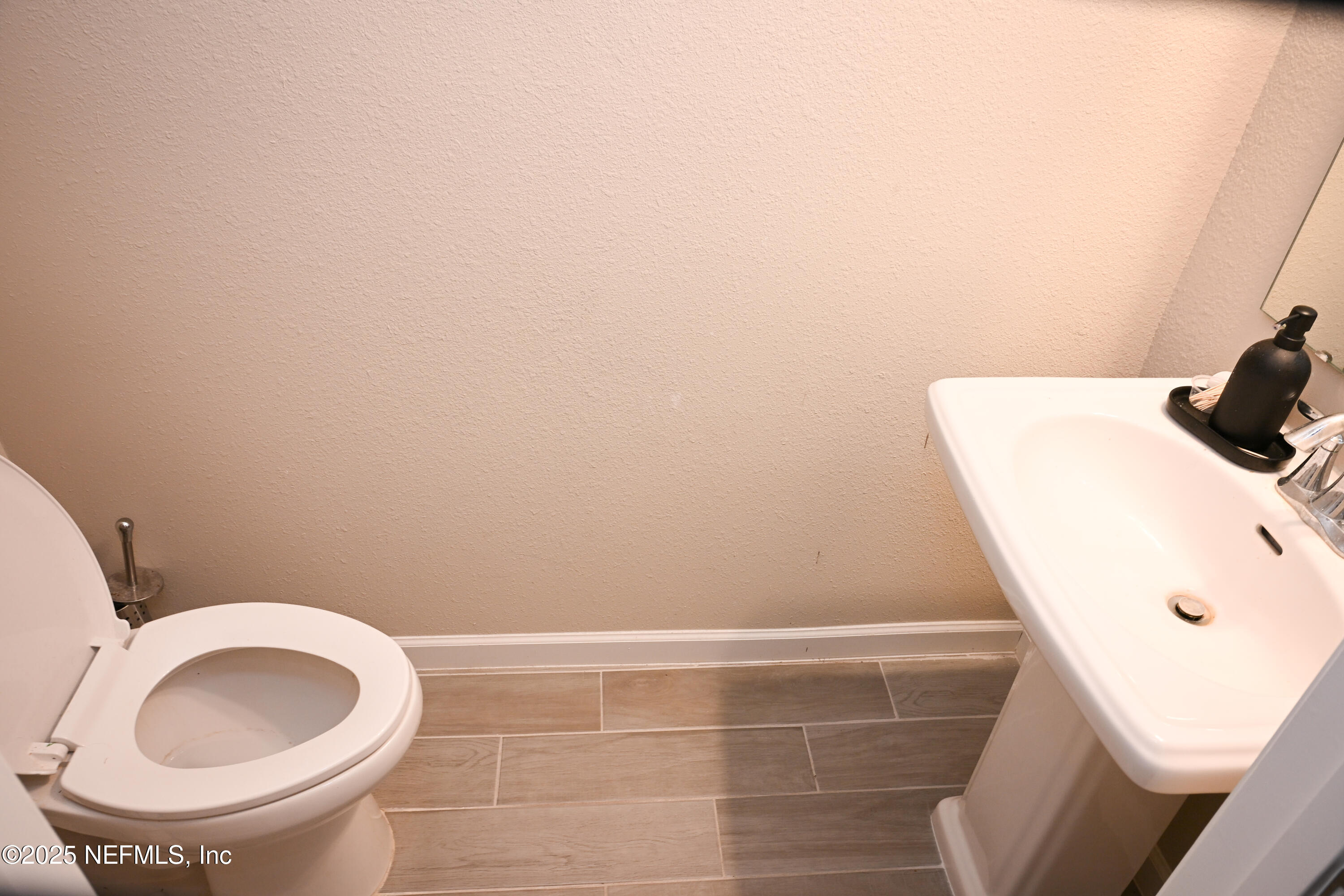 441 Boracay Circle St. Johns, FL 32259 - Photo 12 of 40 a bathroom with a toilet and a sink