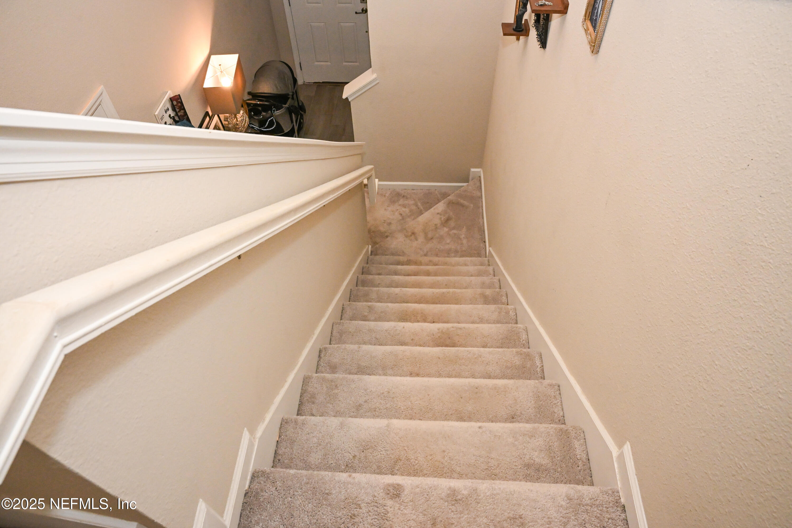 441 Boracay Circle St. Johns, FL 32259 - Photo 14 of 40 a view of staircase with white walls