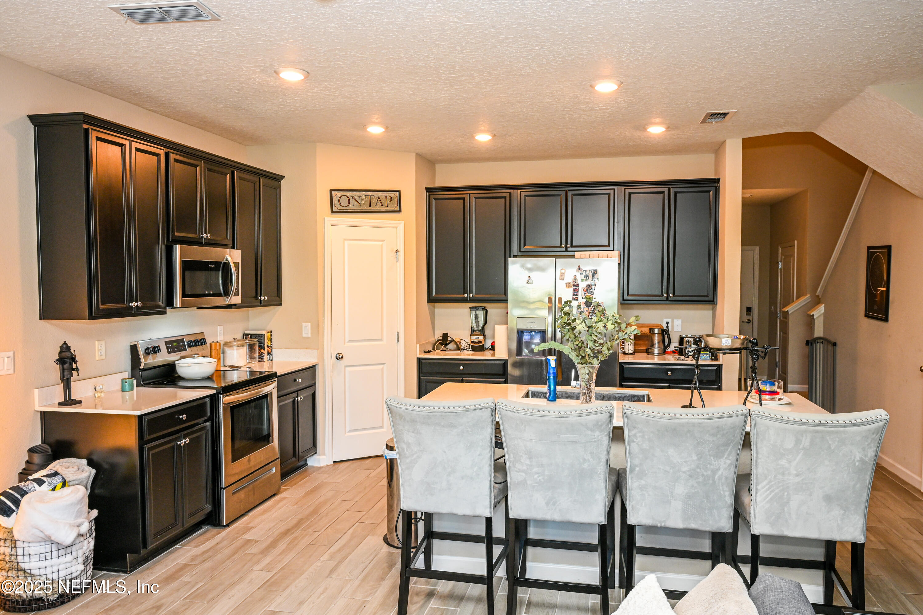 441 Boracay Circle St. Johns, FL 32259 - Photo 28 of 40 a dining room with furniture a window and wooden floor