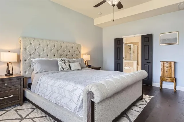 a bedroom with bed and window