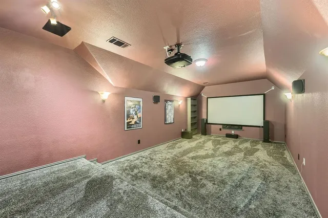 a view of a big room with carpet