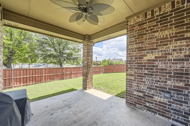 a view of a porch with a backyard