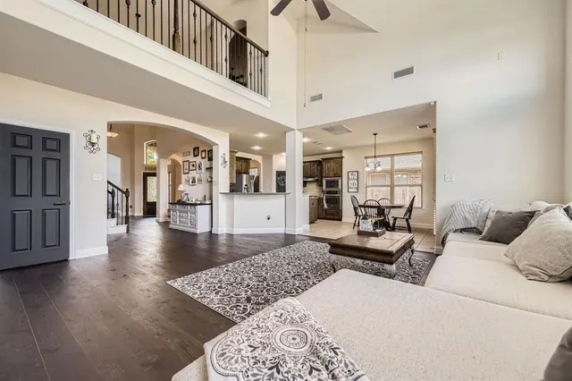 a living room with furniture and a table