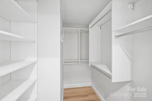a view of an empty walk in closet