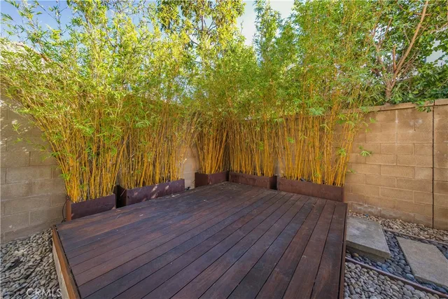 an aerial view of residential houses with outdoor space and swimming pool