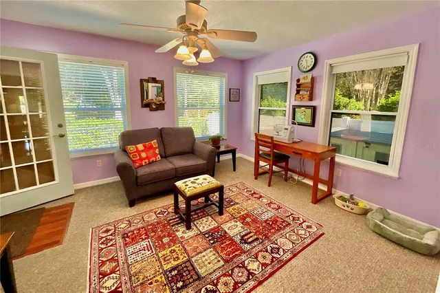 a bedroom with furniture and a window