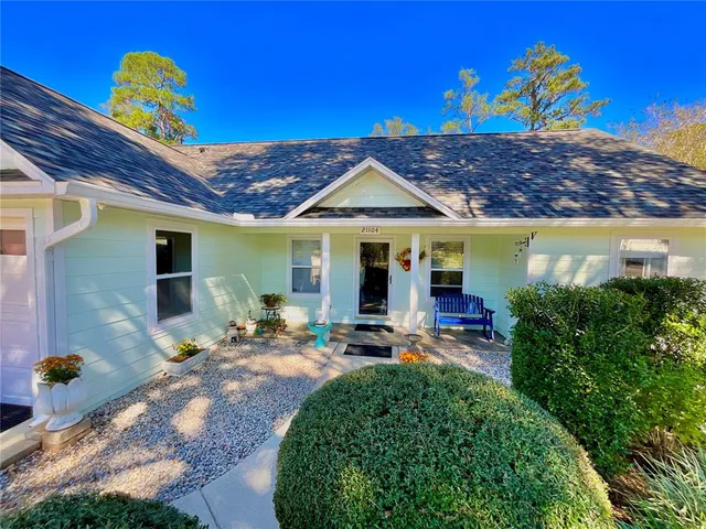 a front view of a house with patio