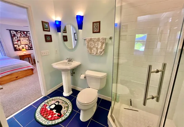 a view of a livingroom with furniture and a flat screen tv