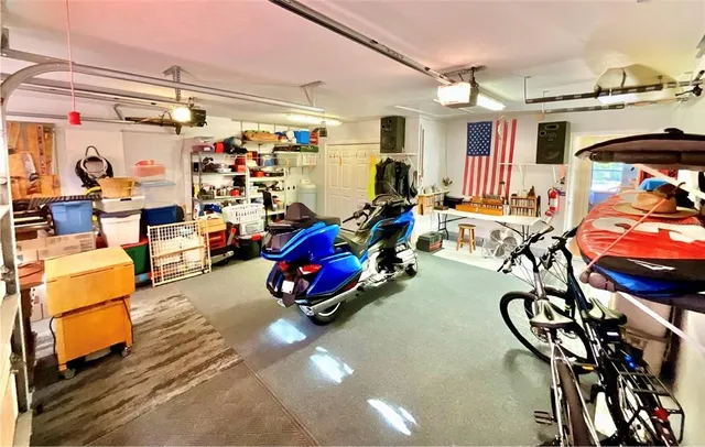 a view of house with backyard outdoor seating