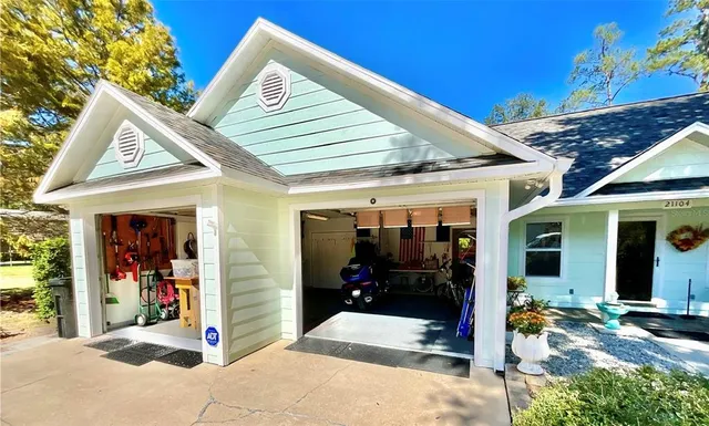 a view of house with outdoor seating space