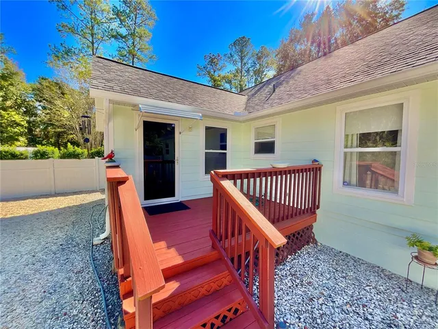 a view of a swimming pool with a patio