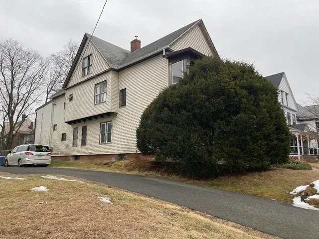 a car parked on the side of a street