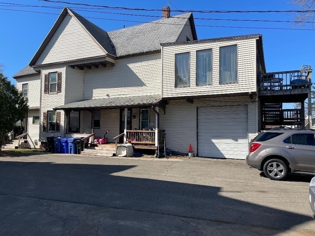 76 Nonotuck Street Holyoke, MA 01040 - Photo 6 of 6 a view of a car park in front of house