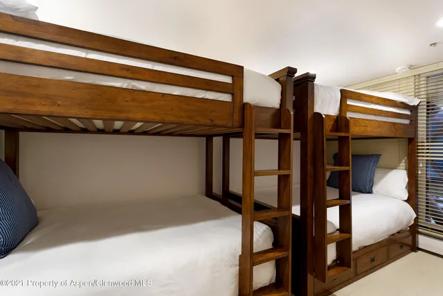 a bedroom with bunk bed