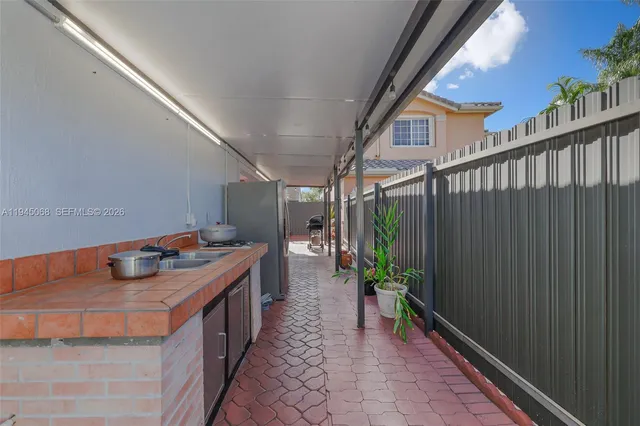 a view of multiple houses with a city street