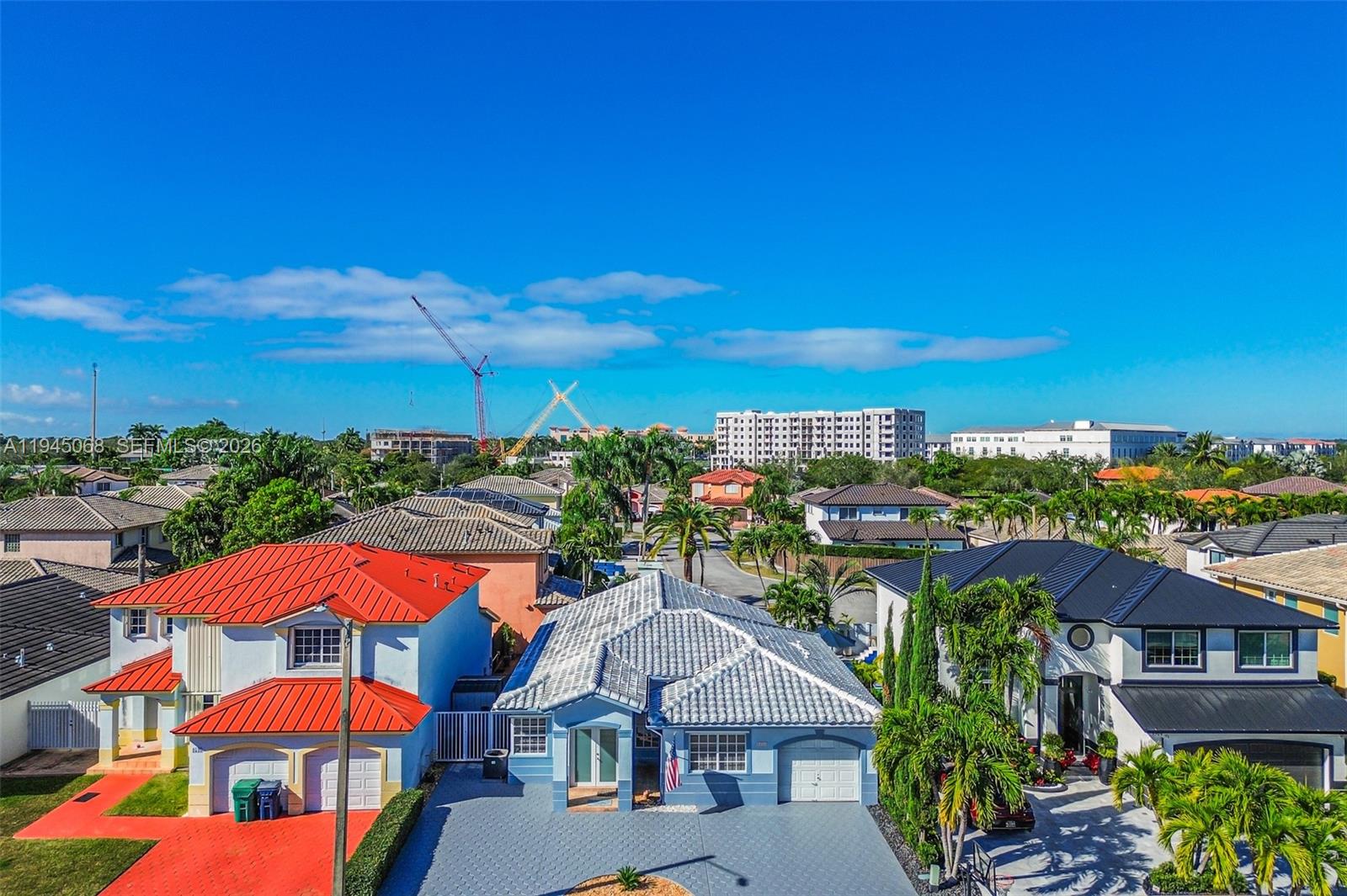9526 Southwest 155th Avenue Miami, FL 33196 - Photo 49 of 53 a view of multiple houses with a city street