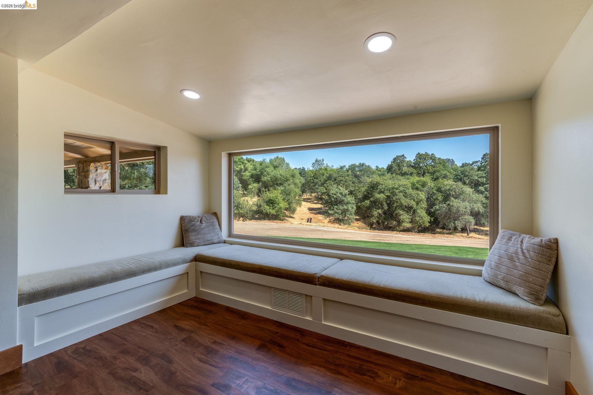 4600 El Caminito Road Shingle Springs, CA 95682 - Photo 23 of 60 a view of a livingroom with furniture and a large window